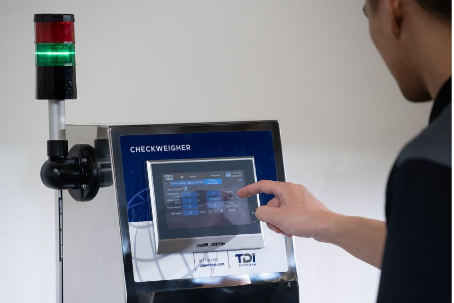 man operating checkweigher